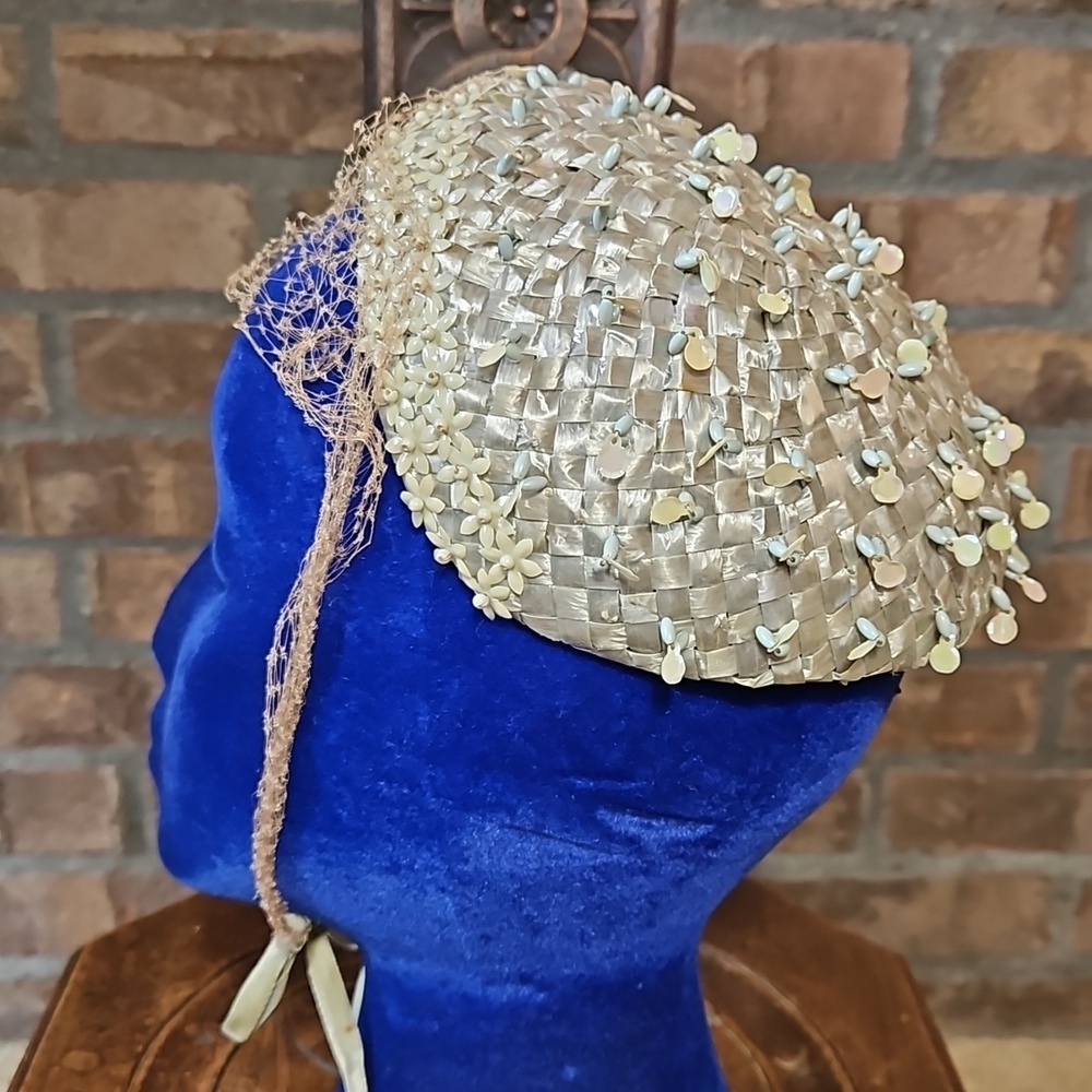 Vintage straw, beaded hat with netted tie from the 1940s or 1950s